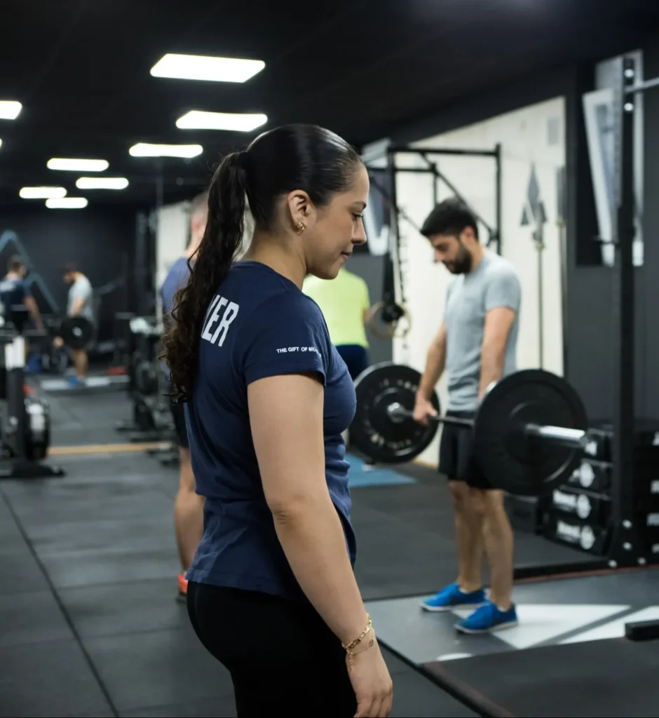 What does a personal trainer do at the gym?